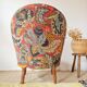 Small "madame" toad chair, vintage, upholstered in multicoloured floral fabric.