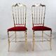 Pair of chiavarine chairs, brass