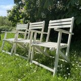 Folding slatted garden armchairs