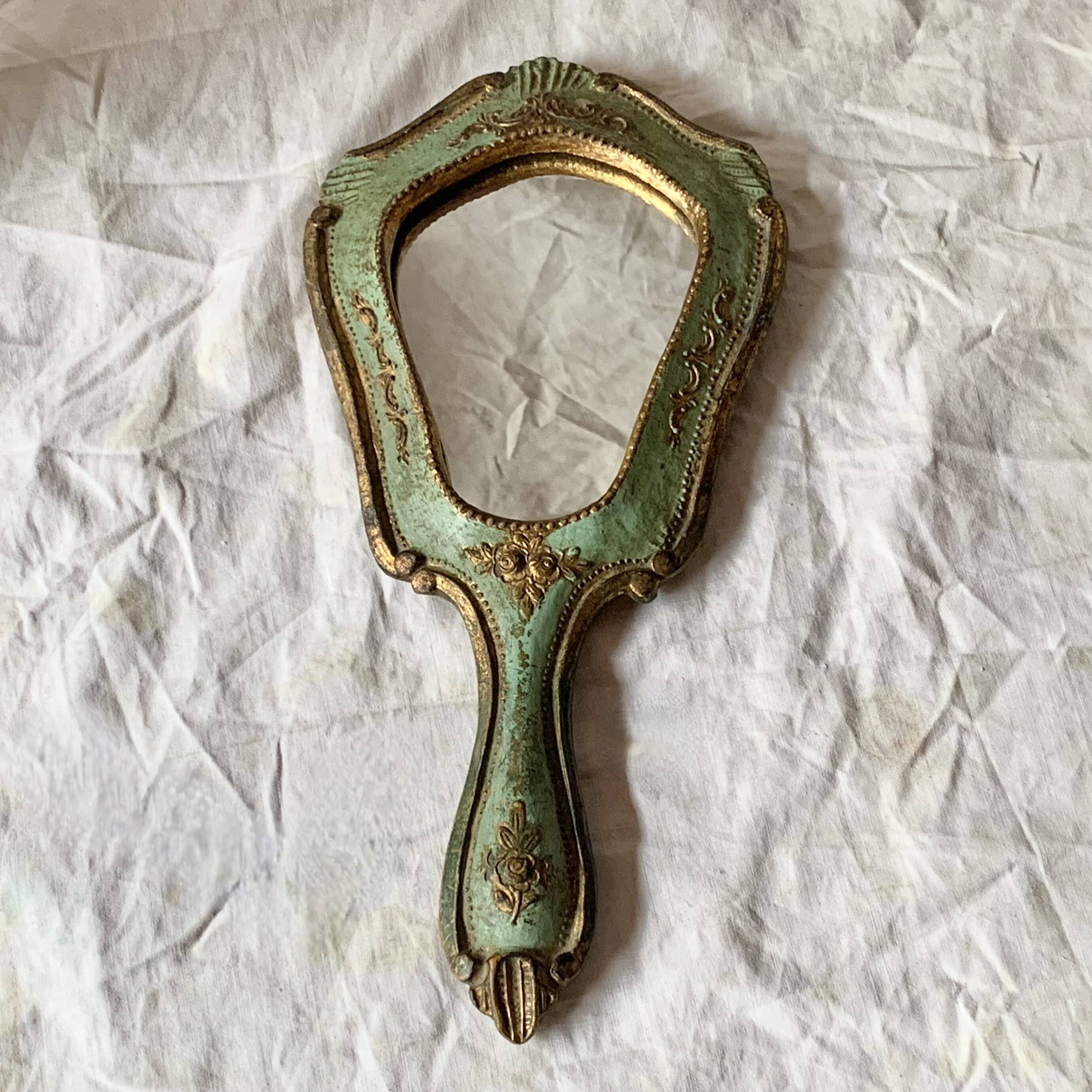 Old Florentine style carved wooden hand mirror