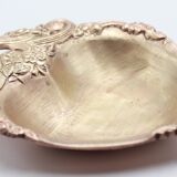 Empty brass heart pocket