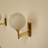 Pair of vintage wall lights in brass and glass from the 70s