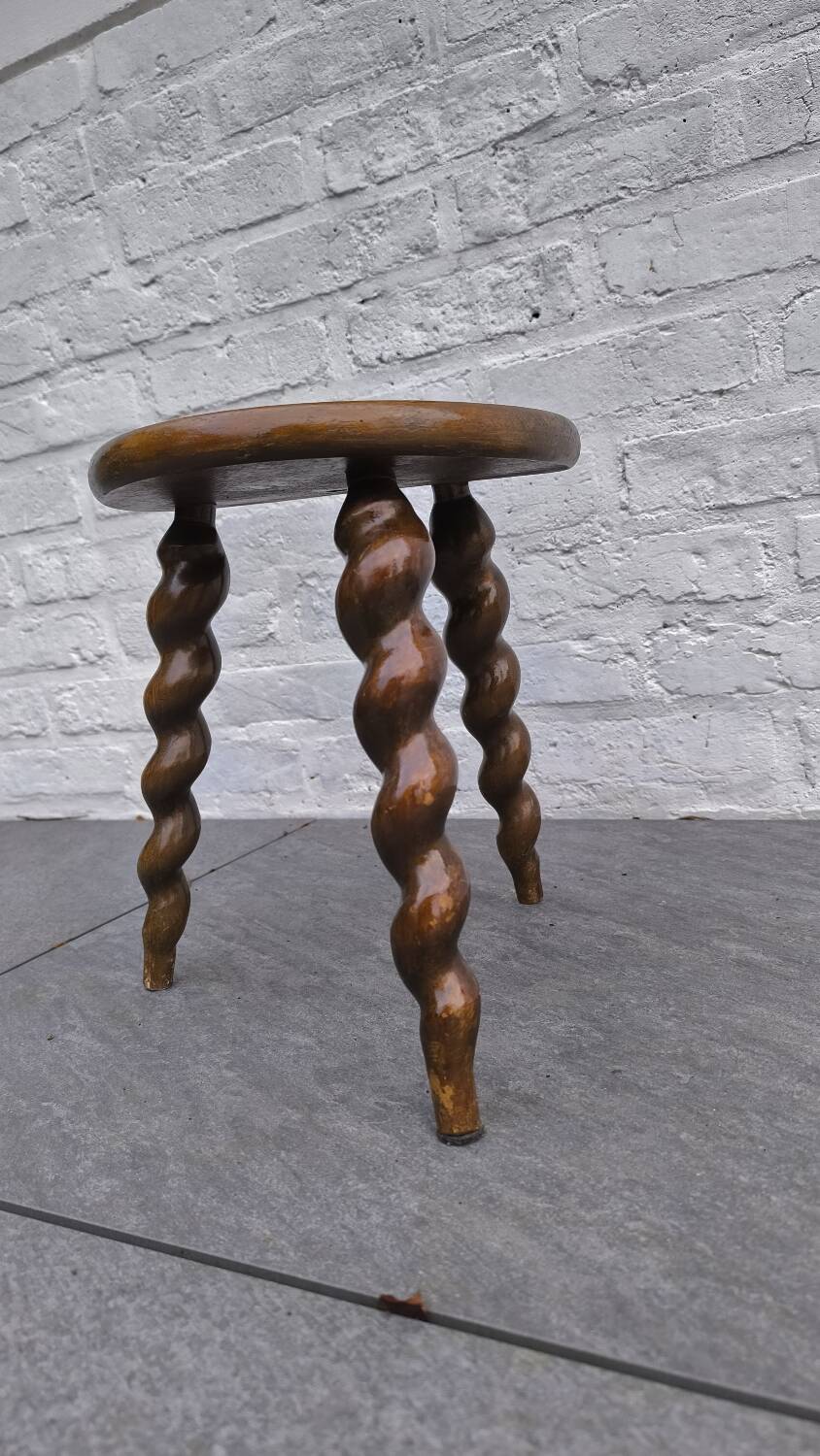 Turned wooden tripod stool
