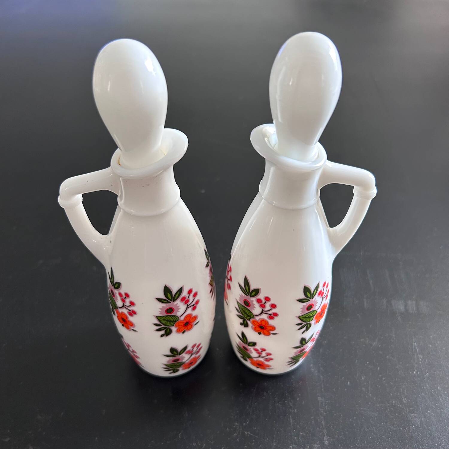 Pair of floral-decorated bottles