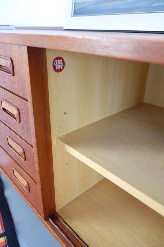 Teak ring buffet in vintage retro style from the 60s-70s.