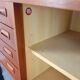Teak ring buffet in vintage retro style from the 60s-70s.