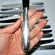 RENEKA Lot of 12 table knives with crossed ribbons and silver-plated metal, 24.5cm
