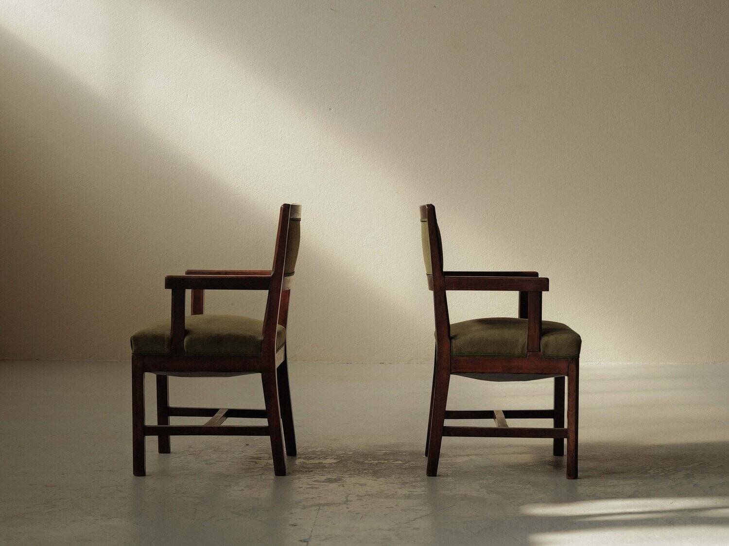 Pair of modernist armchairs in solid oak, France, circa 1940.