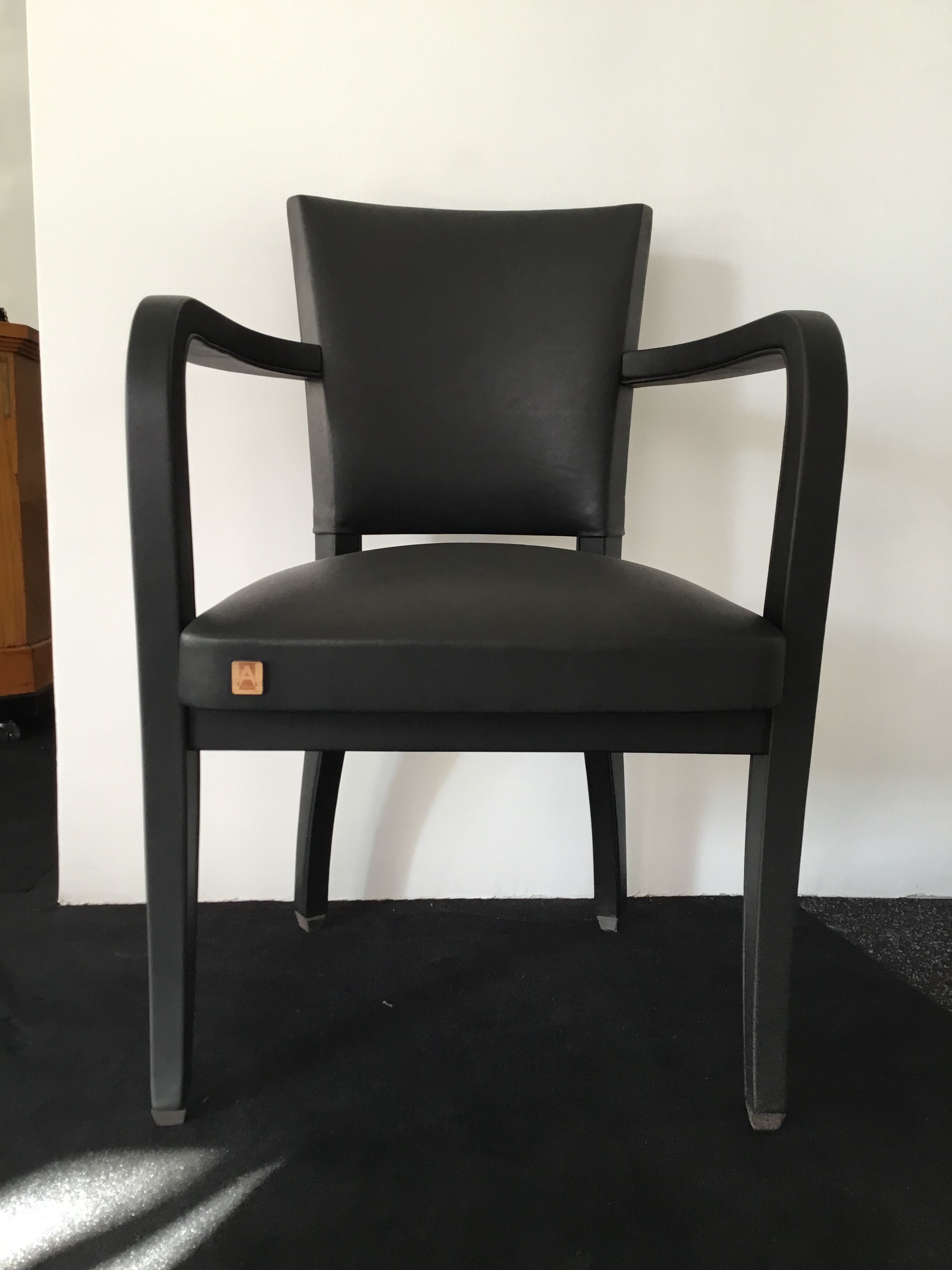 Leather-wrapped black bridge chair