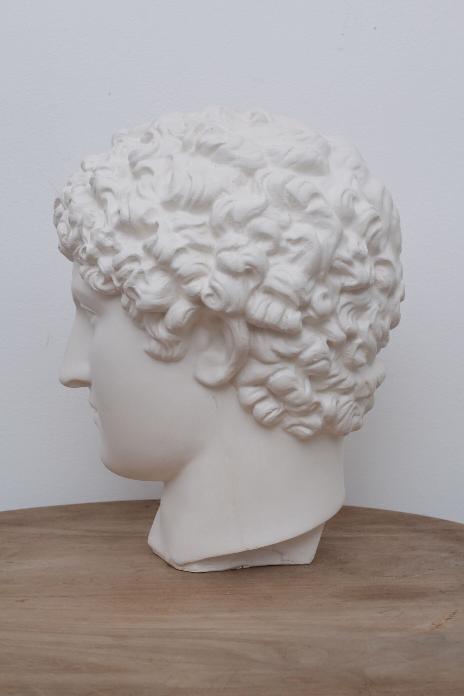 Greek head in matt white plaster