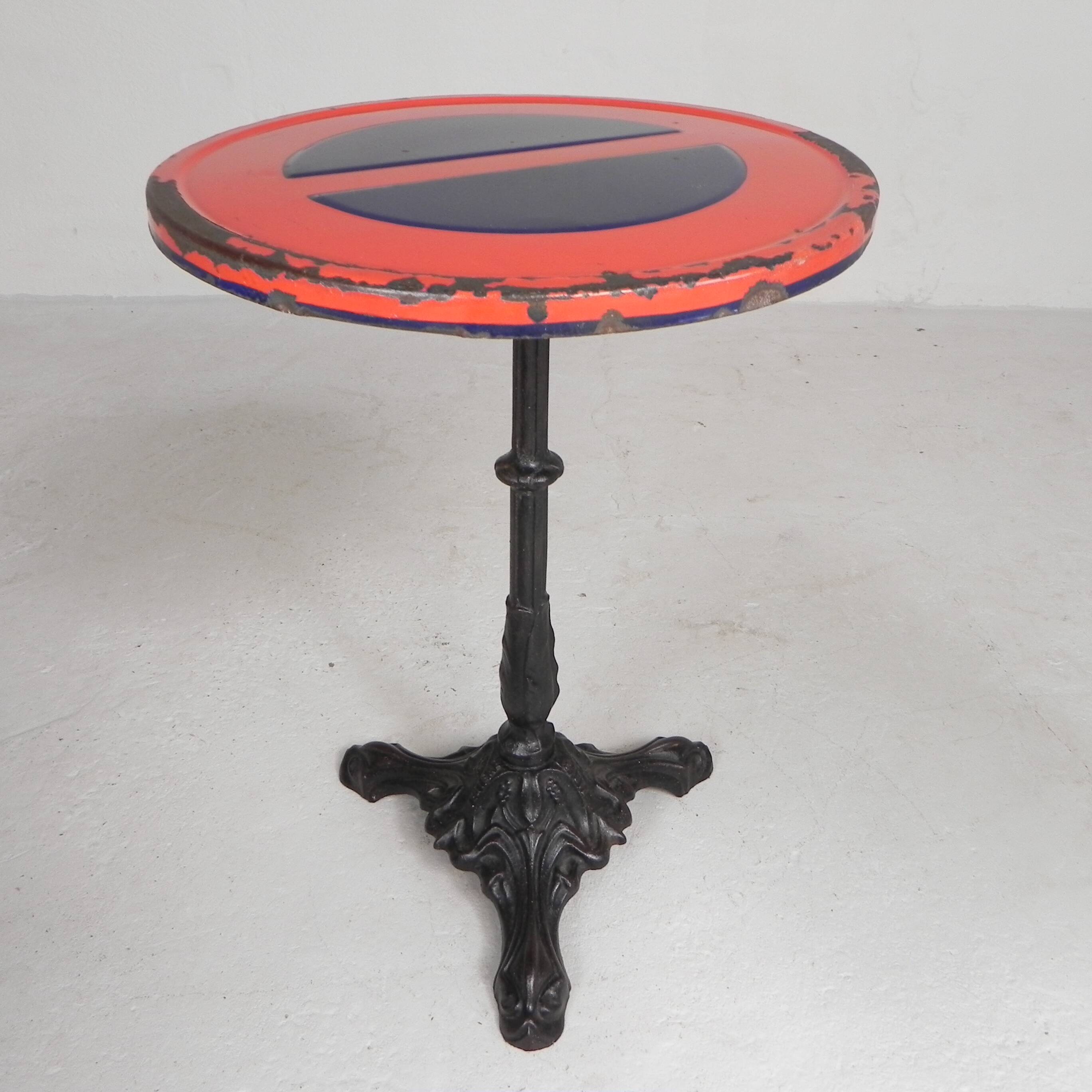 Bistro table with a cast iron base and a traffic sign as a tabletop, Paris 1920s.