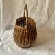 Old woven wicker basket and scoubidou