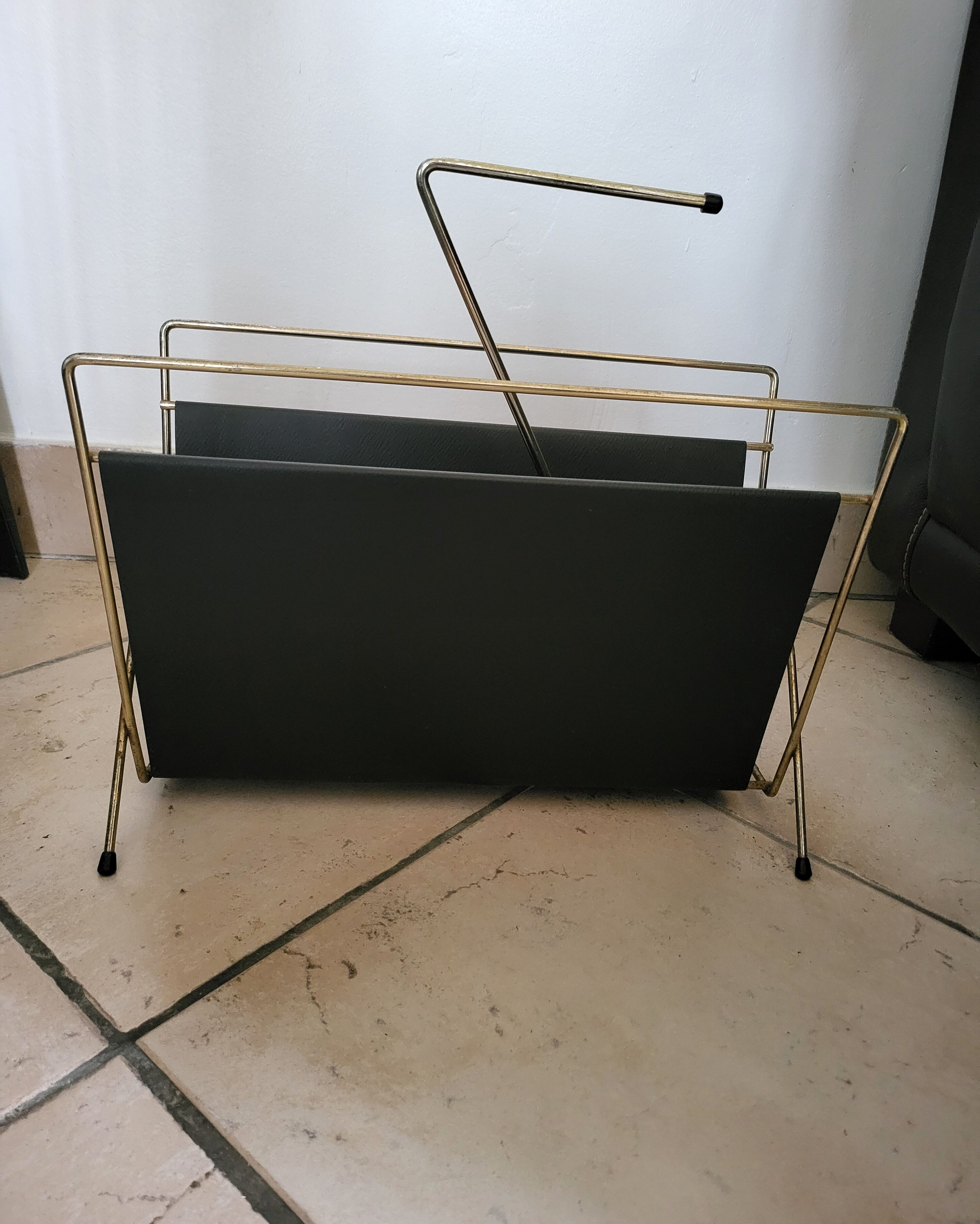 Vintage metal magazine rack in gold and black vinyl Newspaper holder
