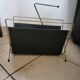 Vintage metal magazine rack in gold and black vinyl Newspaper holder