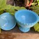 Bonbonnière or sugar bowl in turquoise opaline portieux with stylised dragon decoration.