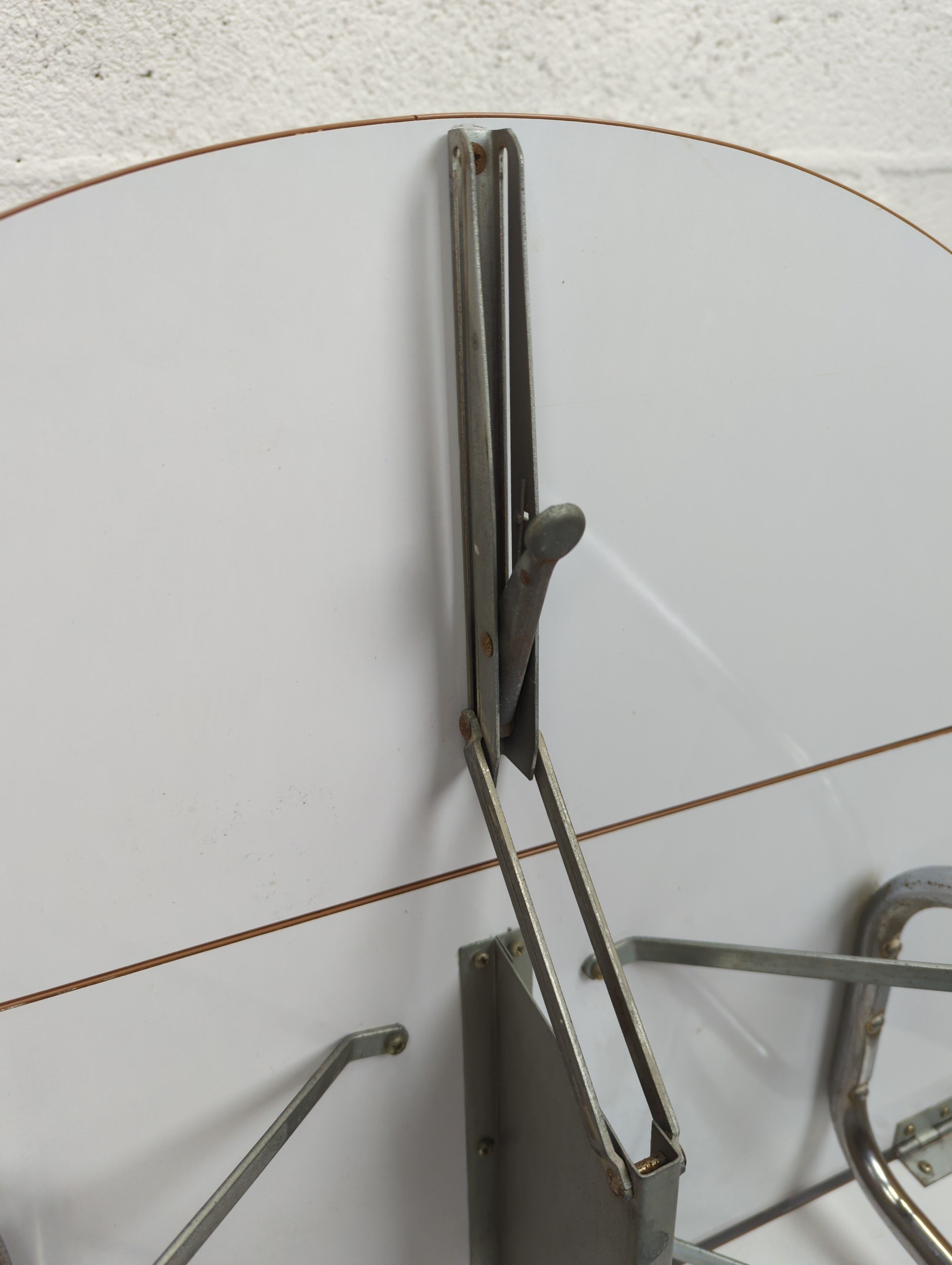 Foldable brown formica table compass legs