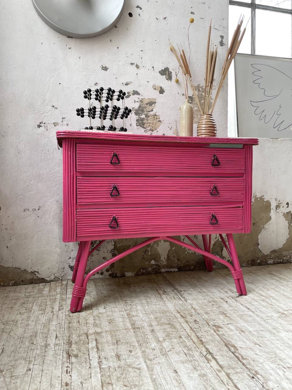 Vintage pink rattan chest of drawers