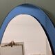 Rare pair of Italian blue oval mirrors, attributed to Cristal Arte, 1970s