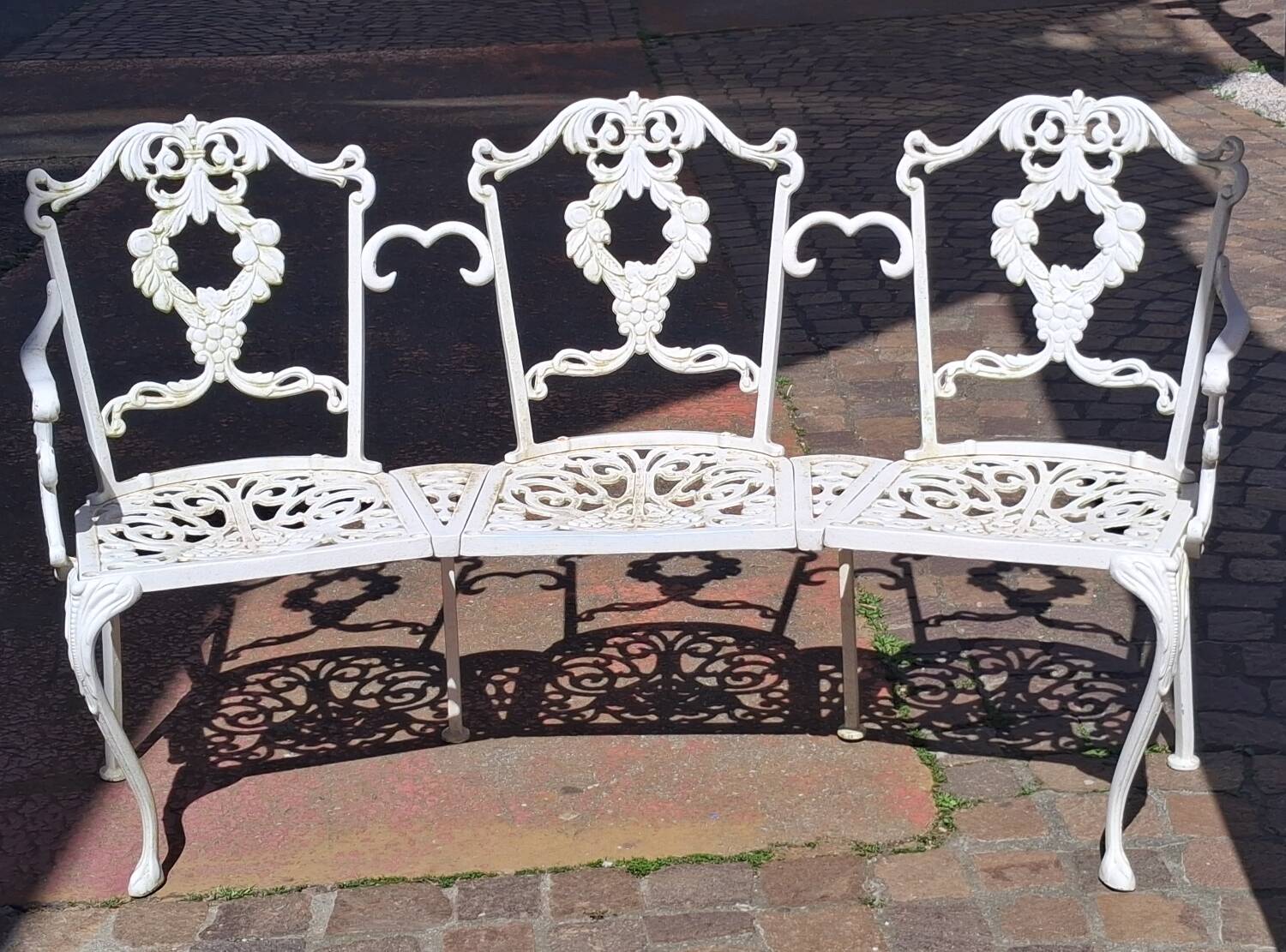 Large terrace or garden bench, made of cast iron, vintage decor.
