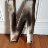 Iron industrial letter