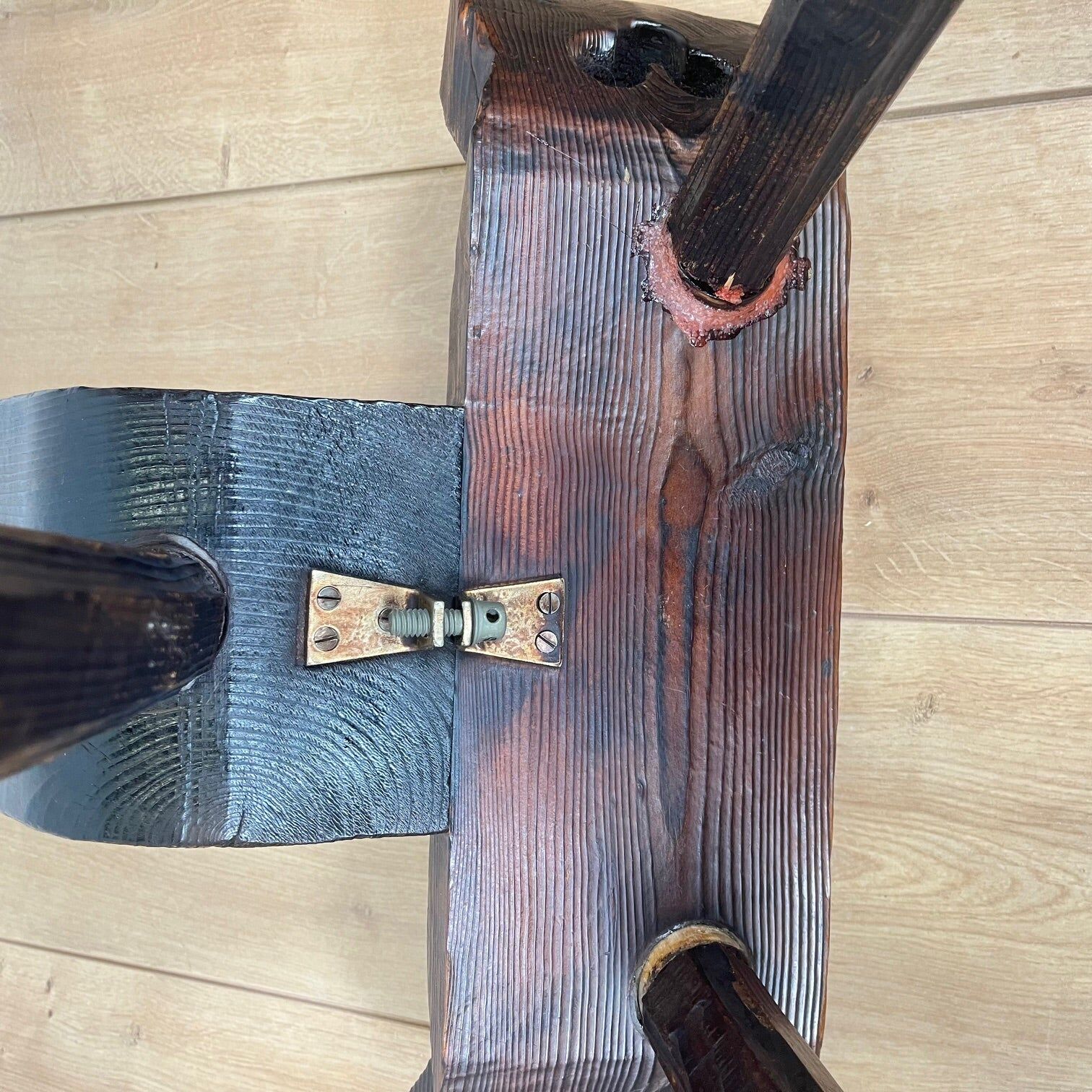 Pair of low tripod chairs in solid wood, mid-20th century.