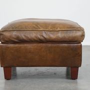 Sheepskin wing chair + XXL patinated footrest