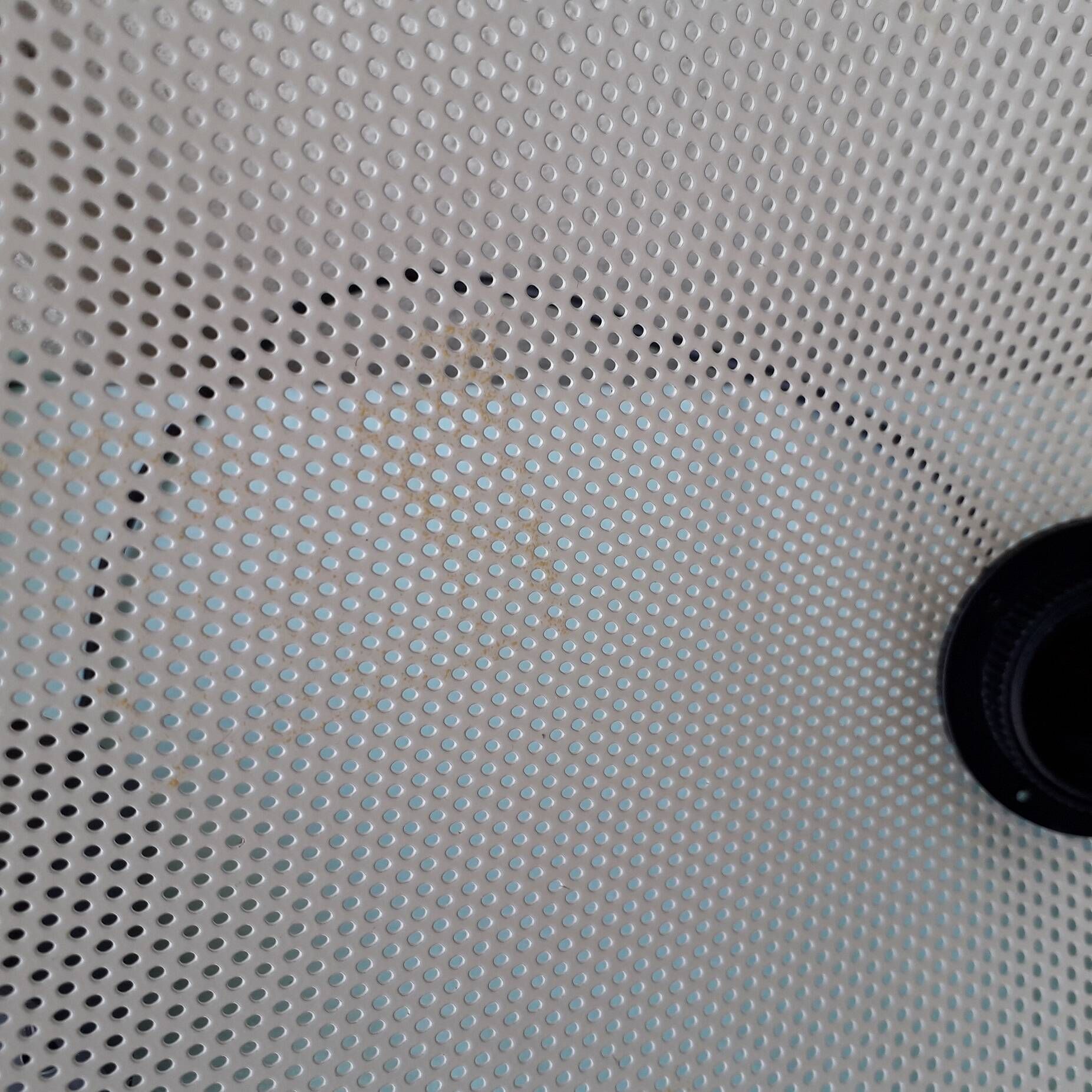 White perforated metal suspension