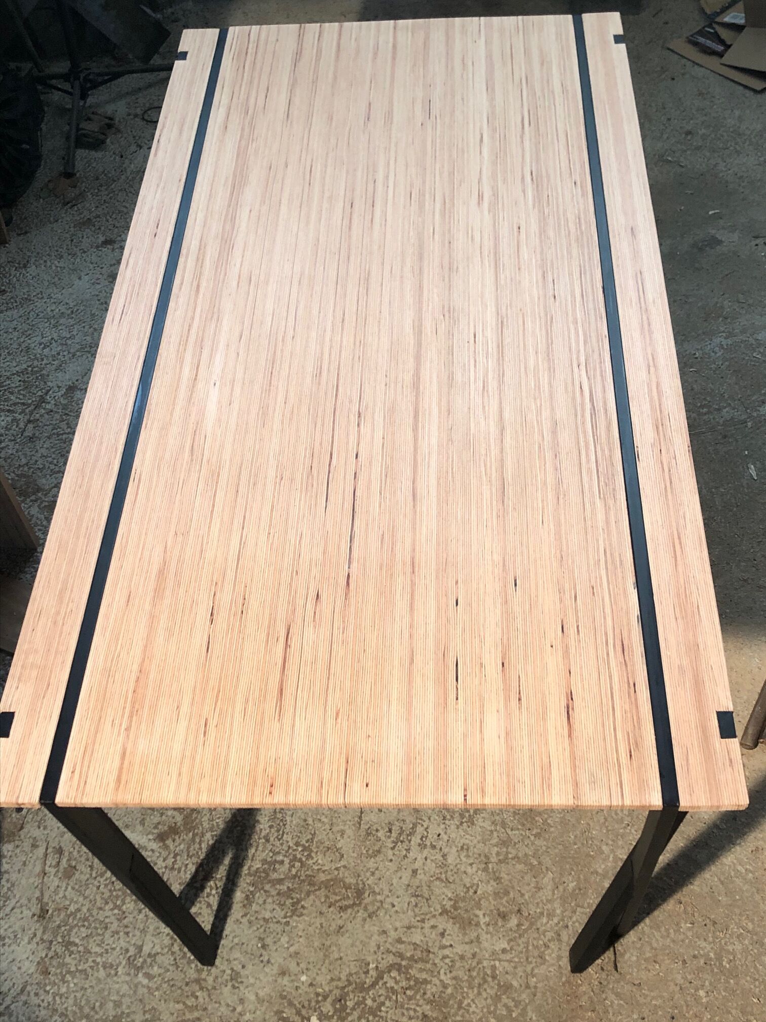 Multiline beech design table and matte black steel