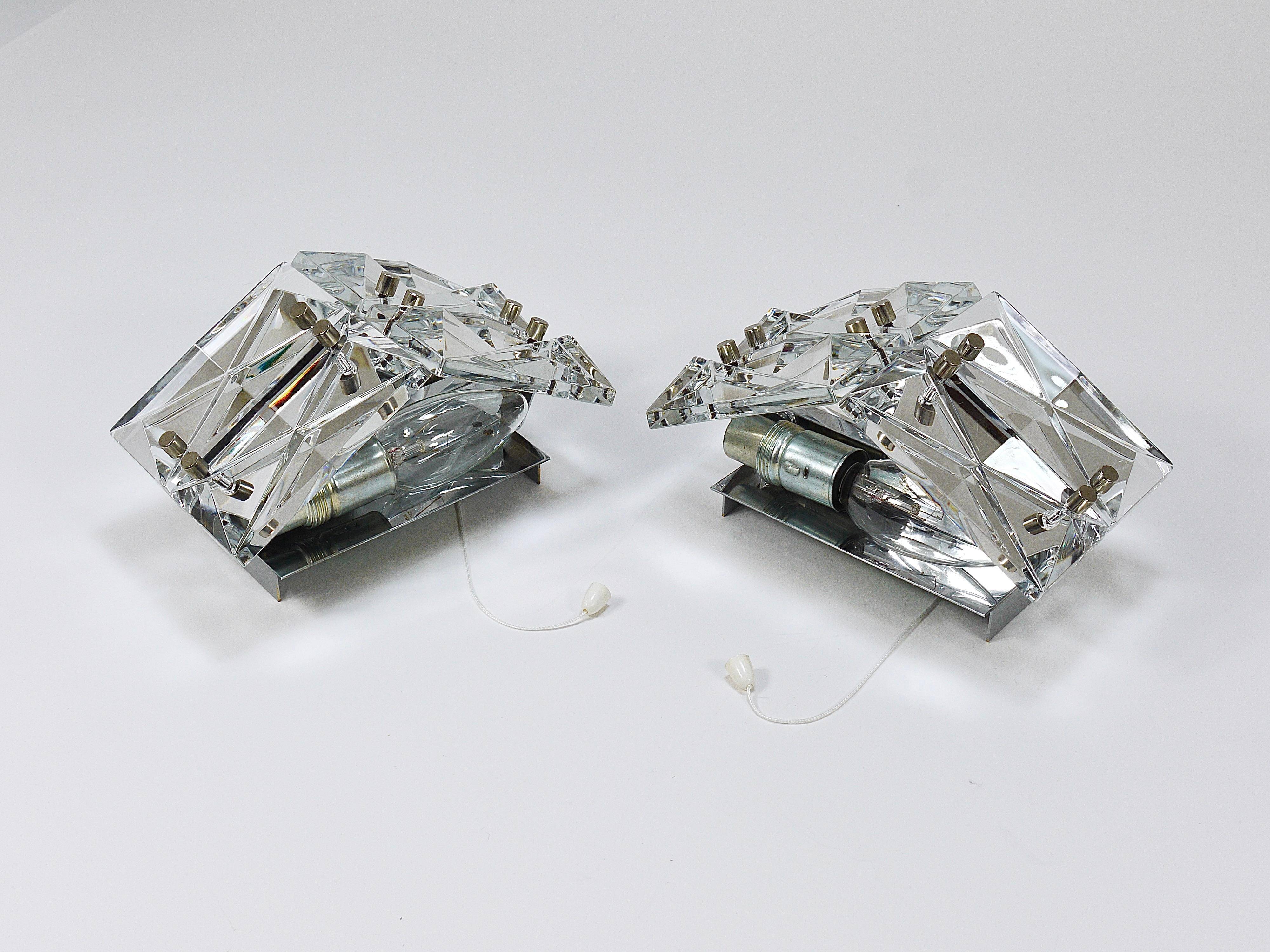 Pair of wall sconces in faceted crystal and chrome / prism glass wall lamps by Kinkeldey
