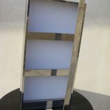 Swivel mirror with shelf at the back