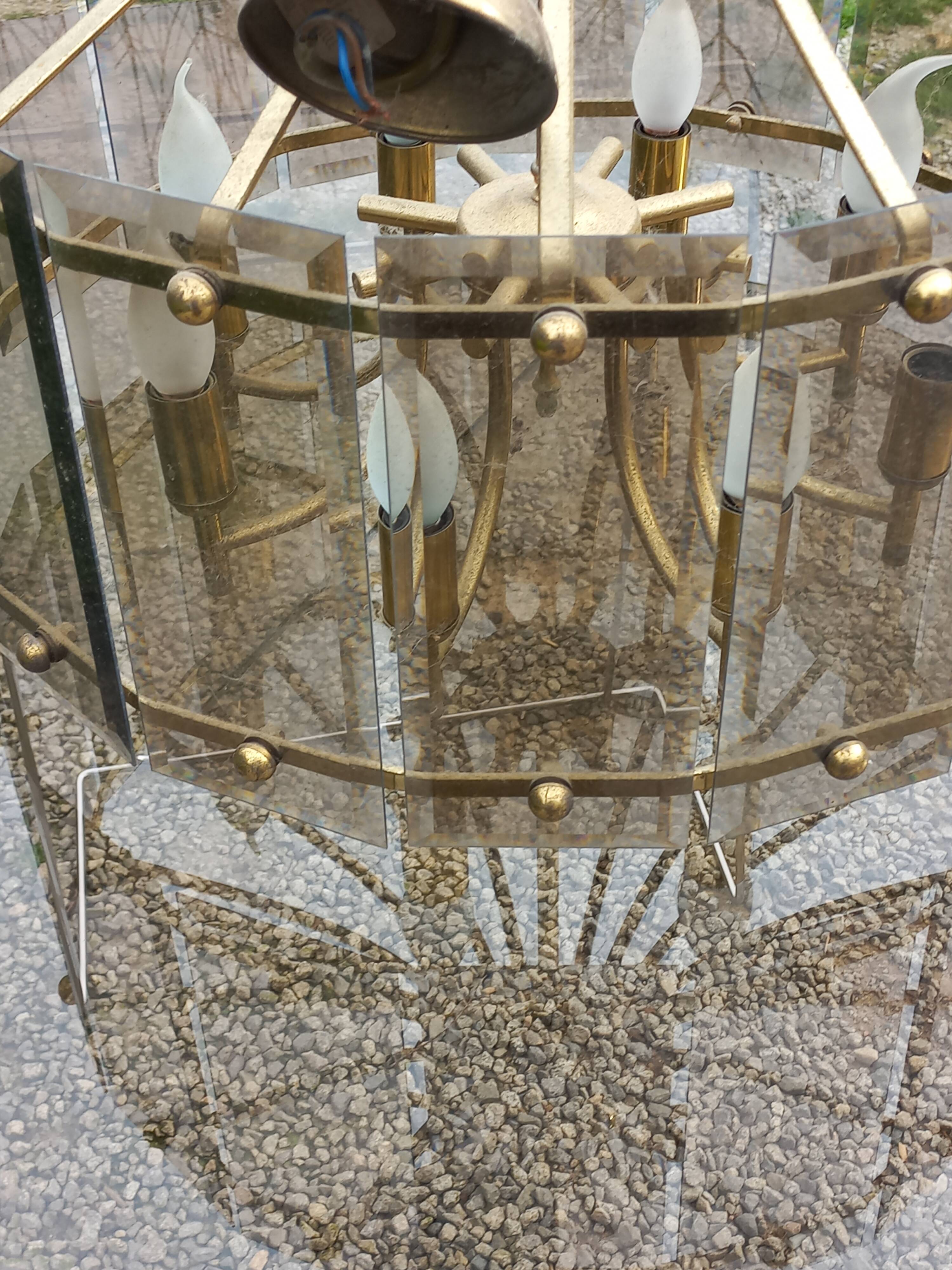 70s designer chandelier with smoked glass plates and gold metal frame