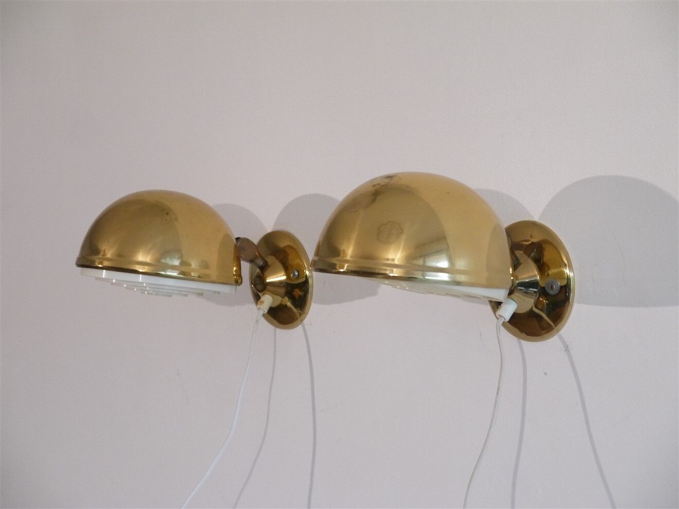 Pair of Danish brass wall lamps by Knud Christensen 1970