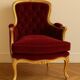 Louis XV armchair in gilded wood and garnet red velvet