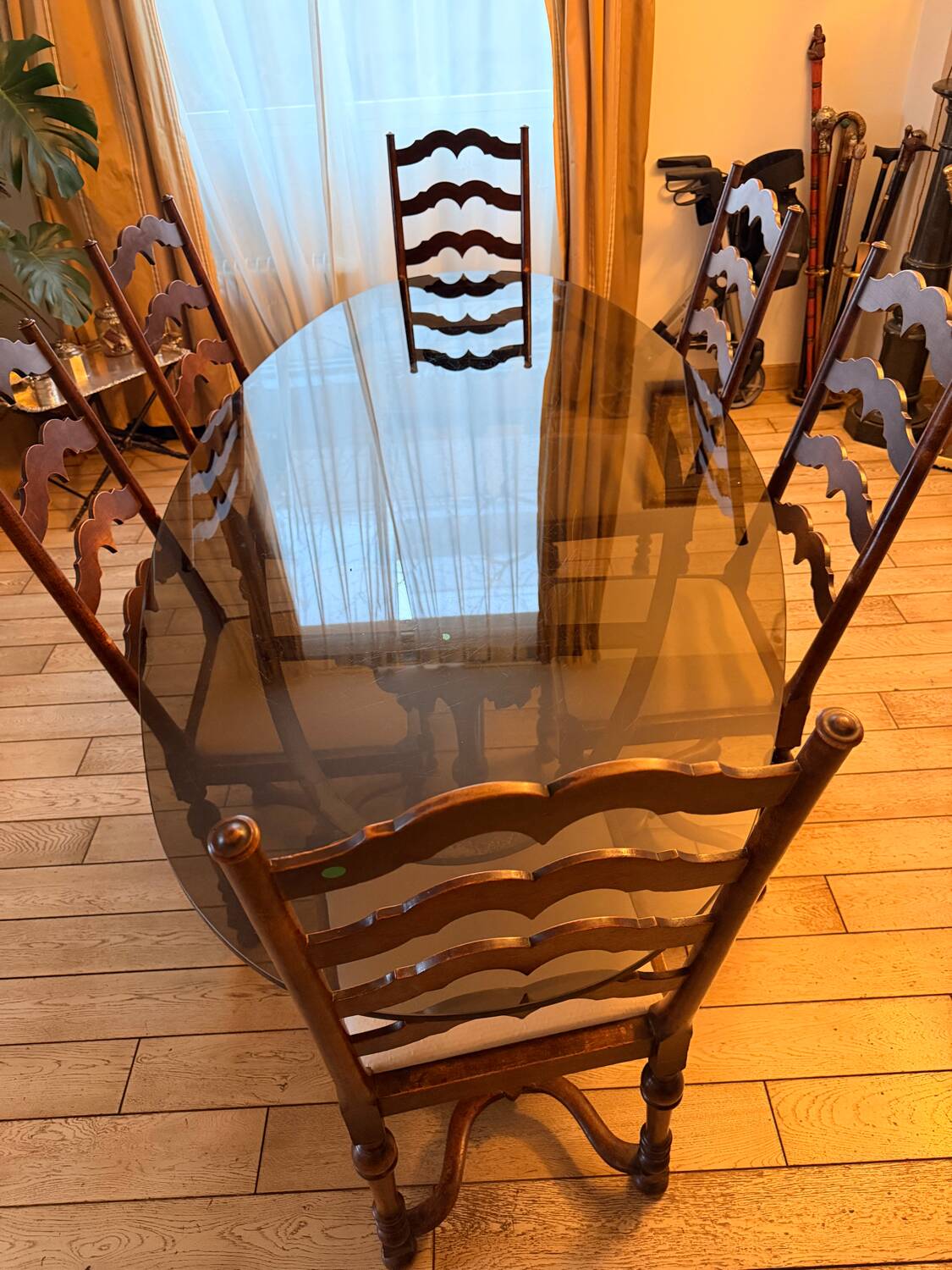 Large antique dining table in wrought iron and smoked glass,