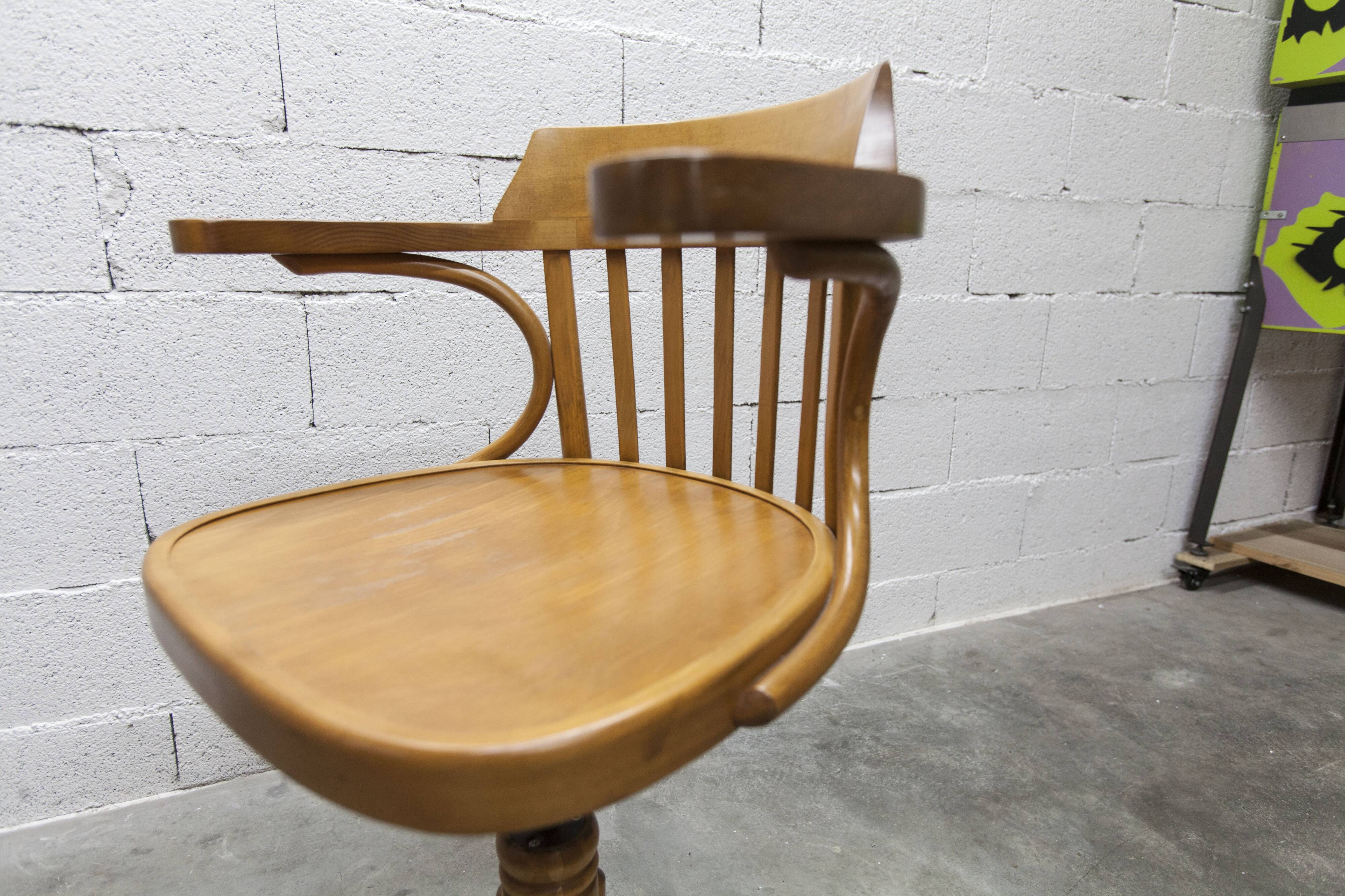 Scandinavian 1960s curved wood swivel office chair
