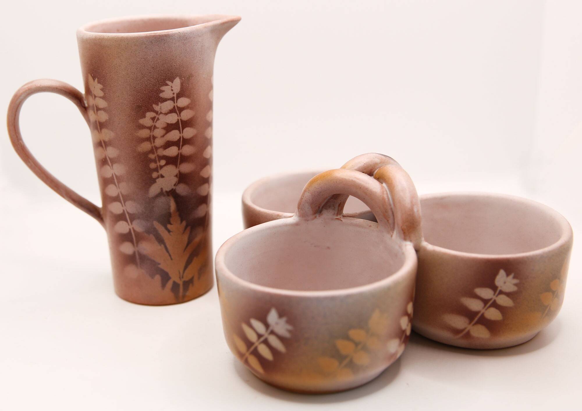 Lot of a pitcher and bowl with old pink flowers by Jean Austruy