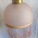 Hanging bell and pink glass garland