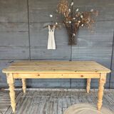 Old farmhouse table in raw wood