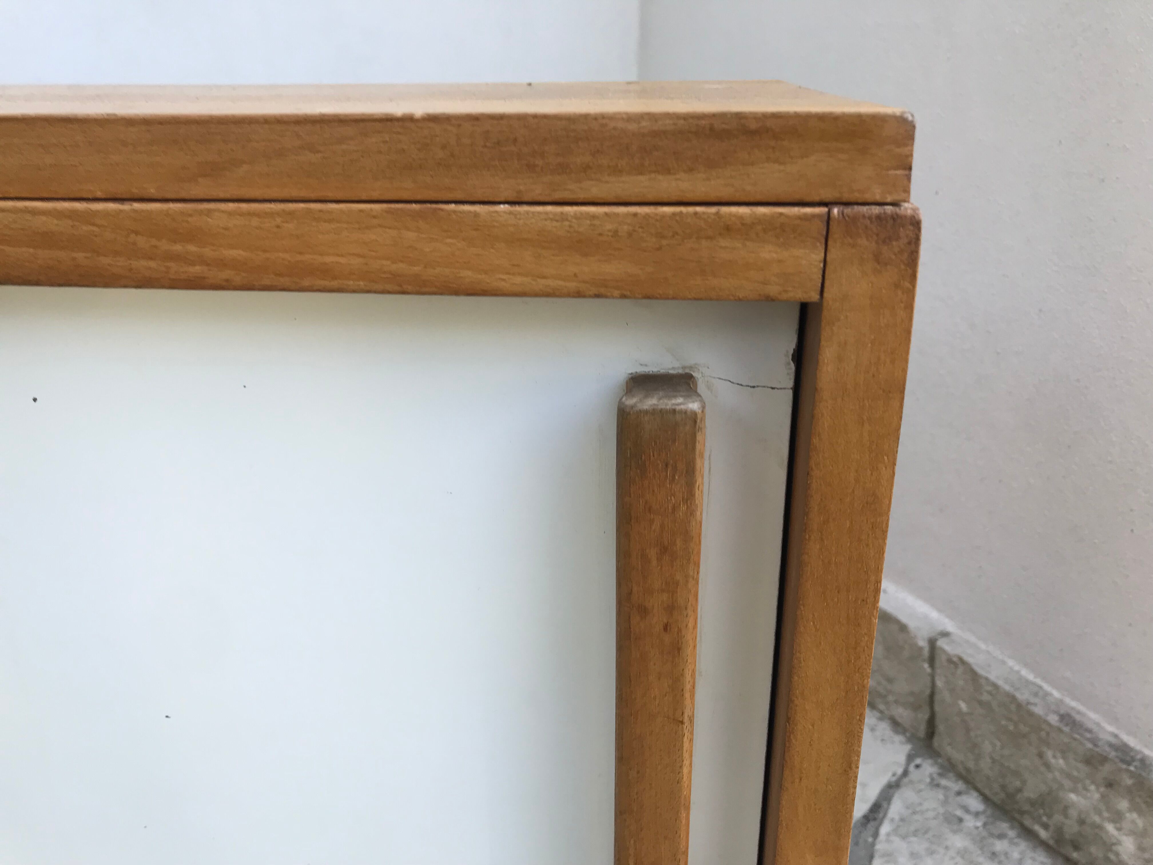 Storage cabinet with sliding doors circa 1950