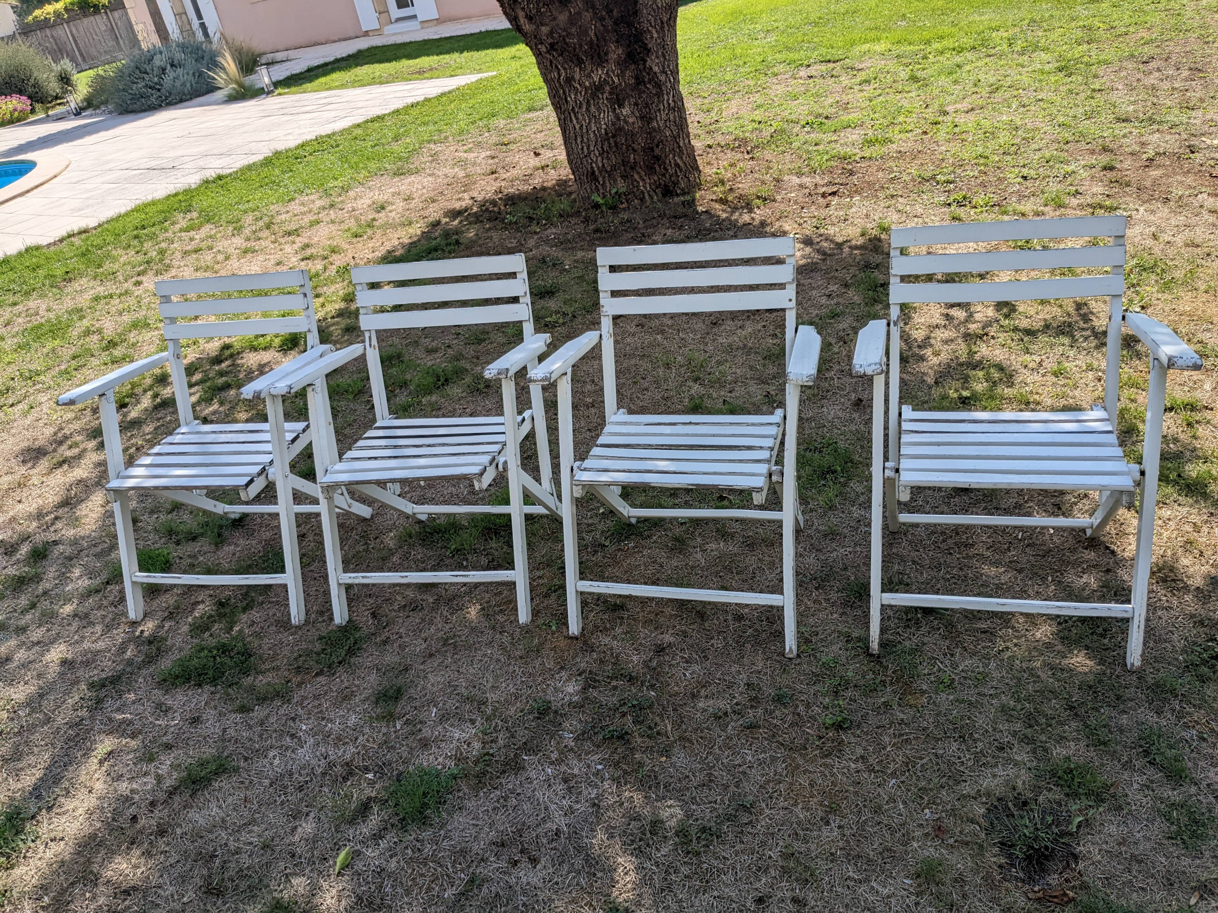 Set of 4 folding wooden garden chairs
