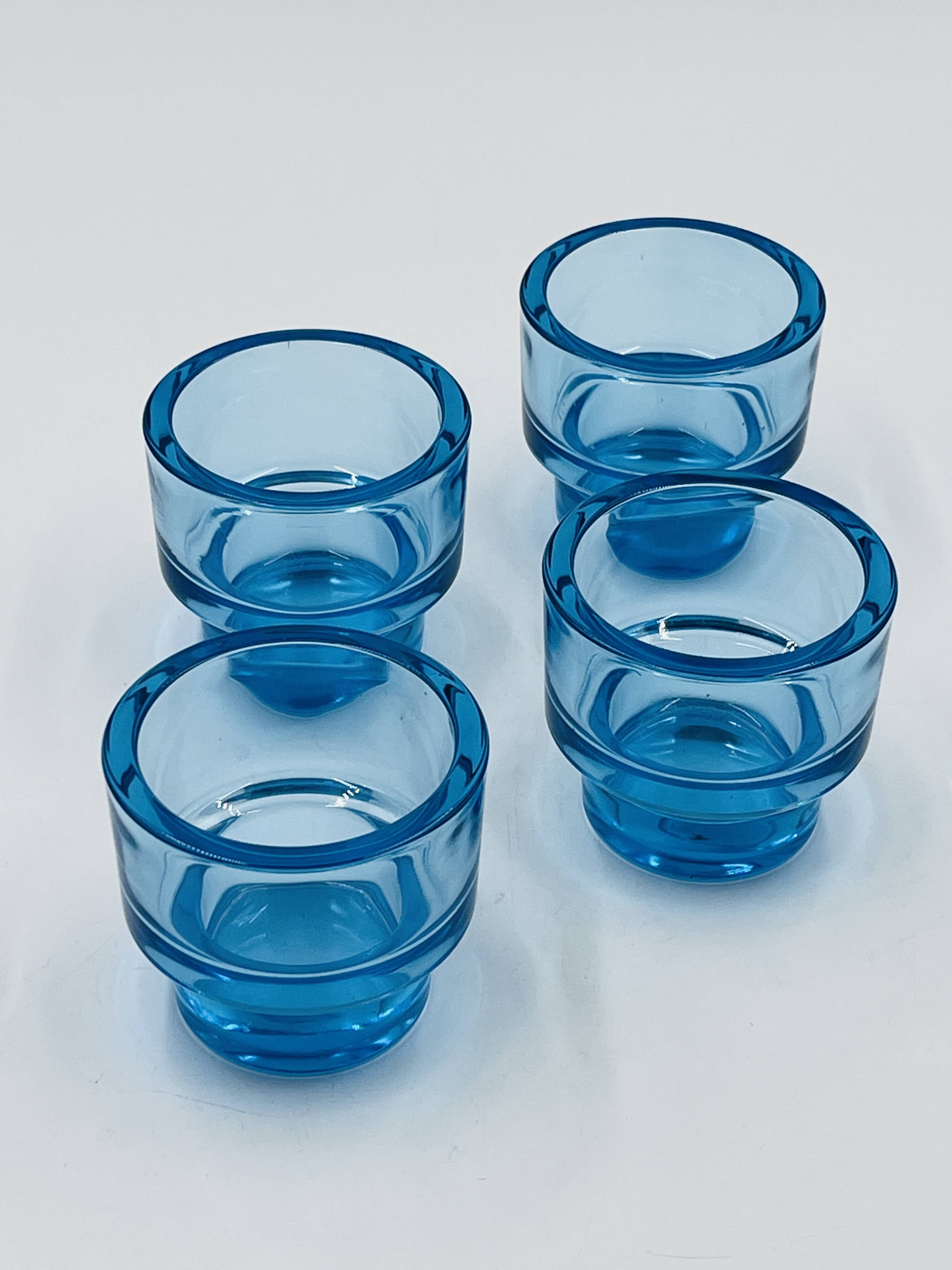 Set of 4 IKEA turquoise aquamarine glass candle holders.