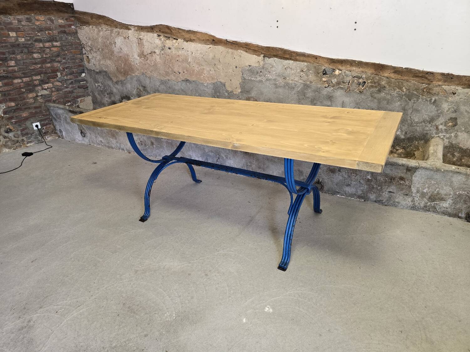 Wrought iron and solid wood table