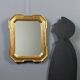 Antique cabaret mirror in gilded wood, Italy, mid-19th century.