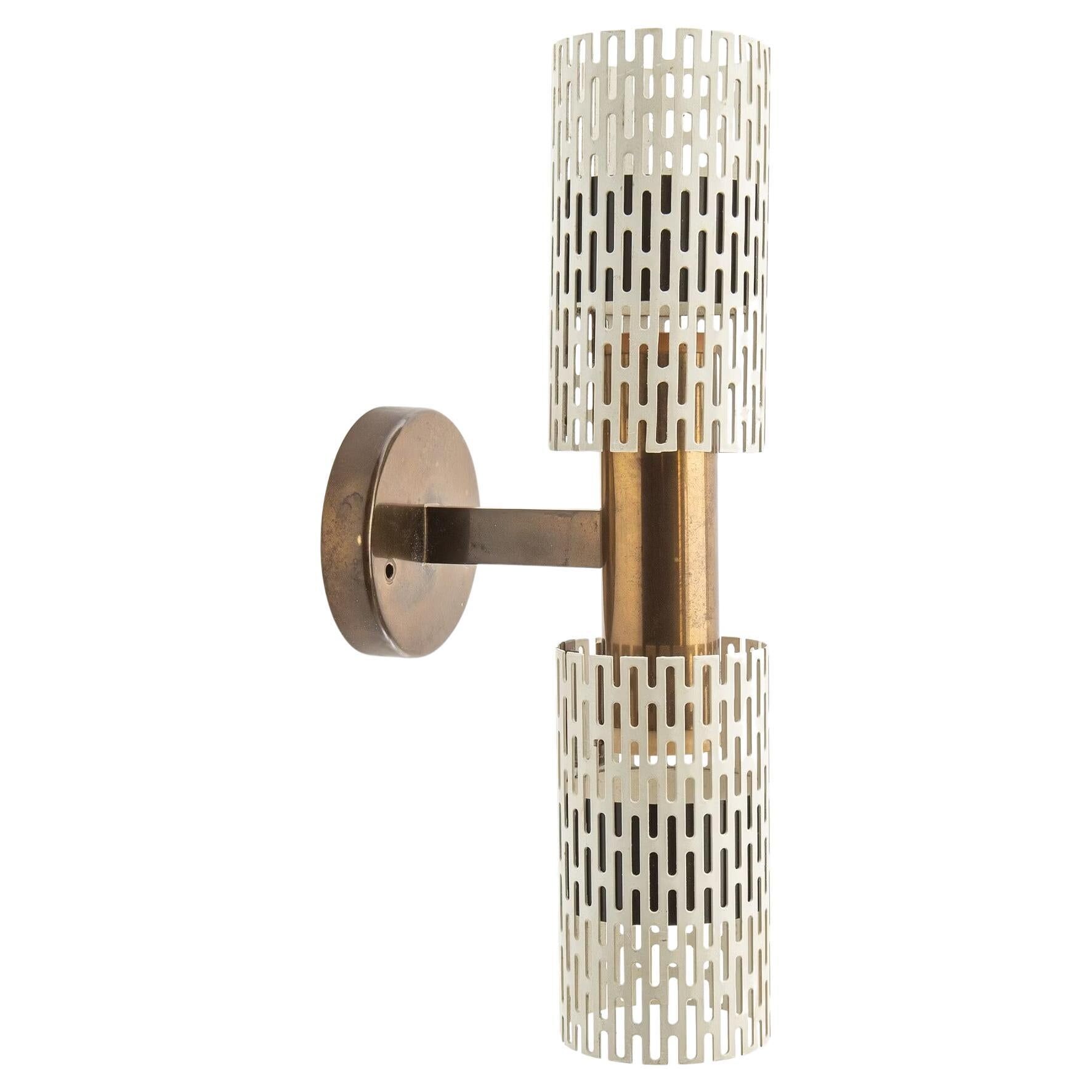 Rare wall light by Harald Notini Model No 11262 for Bohlmarks, 1950.