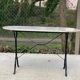Table de bistrot marbre ovale et acier noir 4 couverts 120cm