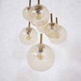 “Cascade” brass chandelier with amber globes