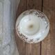 Flat serving compote dish in Terre de Fer HB & Cie with brown floral decoration.
