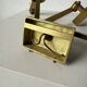 Pair of brass wall lights with articulated arms from the 70s