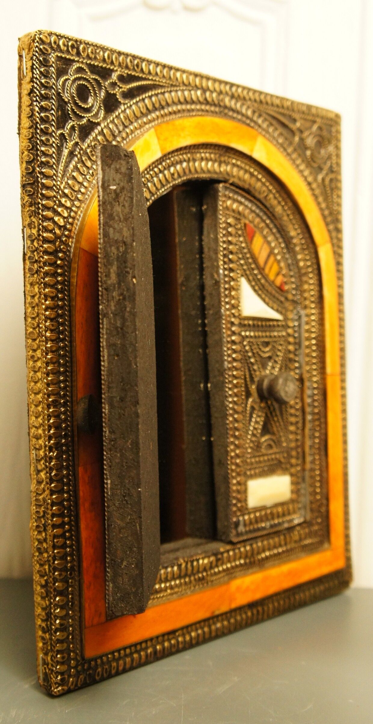 Mirror opening Berber metal, wood, bone and leather, circa 1980