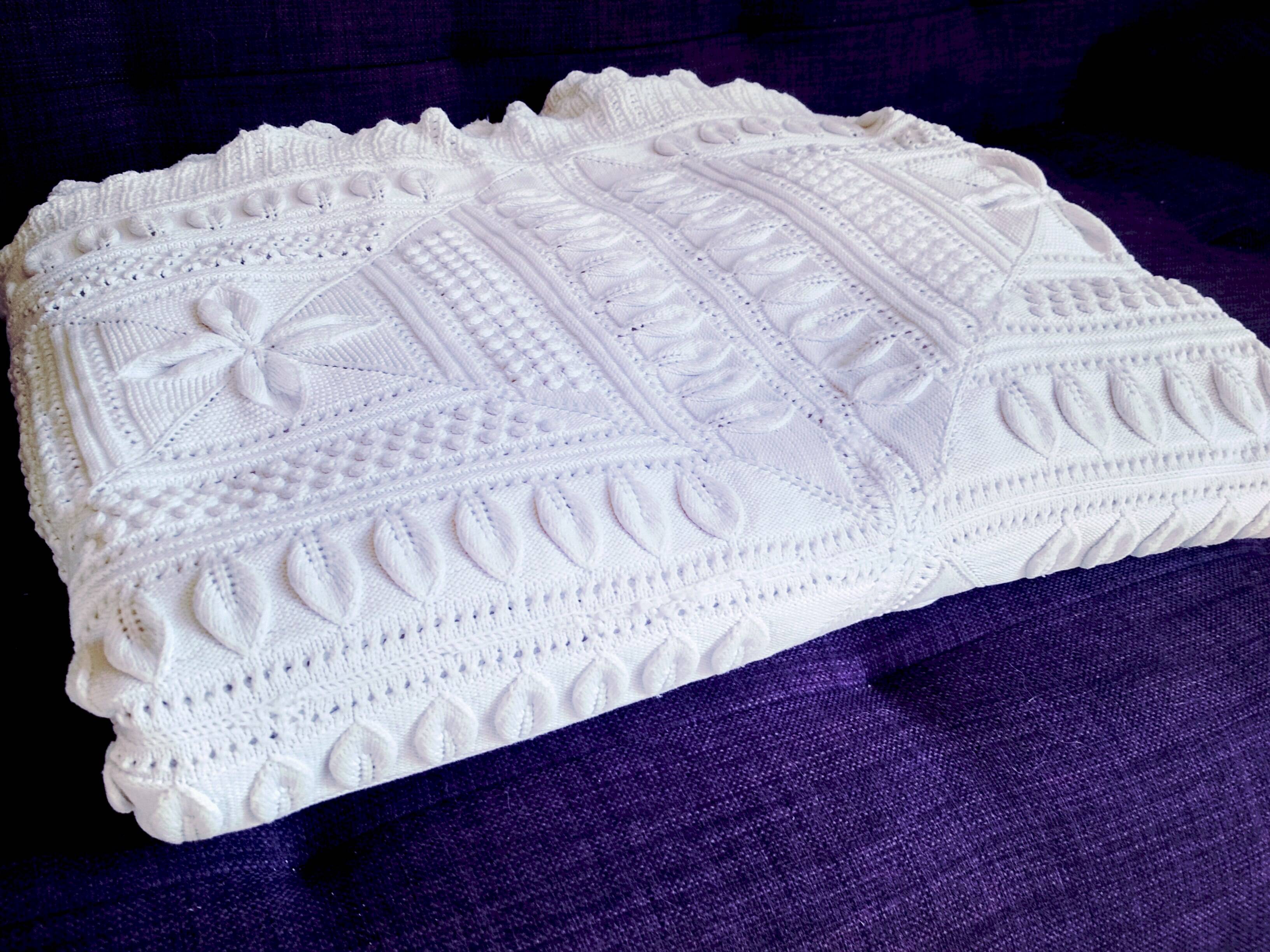 Knitted white cotton bedspread